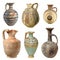 Set of ancient terracotta jugs isolated