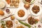 Set of asian cuisine dishes with orange duck, fried gyozas, wok stir fried noodles, shrimp with spicy salts, beef with bamboo and