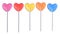 Set of assorted heart shape lollipops isolated on a white background.