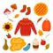 A set of autumn icons - pumpkin, pumpkin pie, berries, mushrooms, knitted woolen sweater, sunflower, warm socks, a cup of coffee
