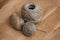 Set of balls of ropes on craft paper. Linen, hemp cotton. Packaging materials.