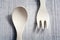 Set Of Bamboo Fork And Spoon In Children Size Lying Against Each Other, Learn To Use Cutlery As A Child Concept