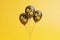 Set of black balloons with yellow percent sign floating on yellow background