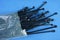 Set of black cable ties in gray cellophane packaging