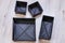 Set of black foldable storage boxes of cloth