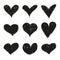 Set of black grunge hearts.