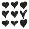 Set of black grunge hearts.