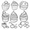 A set of black and white cupcakes for tea, cupcakes with cherry and strawberry decorations