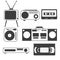 Set of black and white objects of old home appliances of the 80s and 90s in a flat style tape, cassette recorder, VCR, videotapes