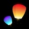 Set of blue and orange flying sky lanterns