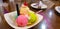 Set of bowls with various colorful Ice Cream scoops with different flavors and fresh ingredients, chocolate, vanilla, and