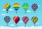 Set of brightly colored hot air balloons in the sky with clouds. Icon design. Vector