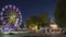 Set. brightly illuminated rotating high speed carousel merry-go-round. Summer evening night in city amusement park