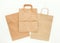 Set of brown eco paper bags, prepared for recycling. Reduce, Reuse and Recycle concept. Flat lay