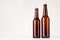 Set of brown longneck beer bottles 500ml and 330ml mock up.