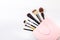 Set of brushes for make up on pink background. Women`s secrets