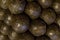 Set of cannonballs black dark weather-beaten metal balls close-up background design of medieval design