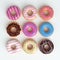 Set of cartoon colorful donuts isolated on white background. Top View Doughnuts collection into glaze for menu design