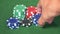 Set of casino chips on green table