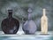Set of ceramic or marble flower pots, wine bottles, vintage vases. Realistic vector empty pots on marble background.