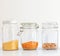 Set of cereals in a glass jar on a white background, chickpeas l