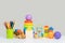 A set of children`s educational toys on a gray background for the development of fine motor skills of the hands. Games for the