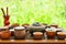 Set of Chinese Japanese Tea Cups Pot Bowls Utensils on Bamboo Wooden Dripping Tray. Preparing Ceremony. Cozy Atmosphere