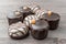 Set of chocolate candies, collection of black, milk and white sweet pralines on wooden background