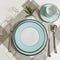 Set of clean tableware, dishes, plates, utensils