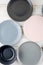 Set of clean tableware pastel color on wooden background