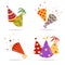 Set and collection of different cones of holiday paper party caps and hats.