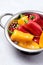 Set of Colored Bell Peppers in Bowl Ripe Peppers Gray Background Vertical