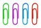 Set of colored paperclips on a white background