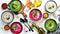 Set of colored soups on white wooden background. Beet soup, broccoli cream soup and mushroom soup.