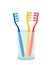 Set of colored toothbrushes in a glass. family oral hygiene concept