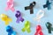 Set of colorful cancer awareness ribbons flat lay in blue background. World Cancer Day concept.