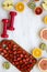 Set of colorful fruits, dumbbells, top view. Fitness concept, diet plan. Flat lay, top view, overhead