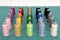 A set of colorful spools of thread on green cutting mat