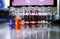Set of colourful glassy laboratory vials for chemicals
