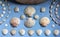Set, composition of sea shells scallops on blue background