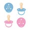 A set consisting of baby pacifiers in blue and pink colors. Collection of nipples.Baby nipples, side view and bottom