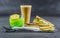 set consisting of two sandwiches malted bread with vintage cheddar cheese, pickles, red onion, tomato, lettuce, green drink and c