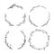 Set of cute detailed hand drawn floral wreaths isolated on white