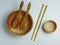 a set of cutlery, consisting of a bowl, spoon, fork, chopsticks, and a small soup bowl