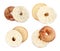 Set with delicious bagels with cream cheese on white background, top view