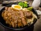 Set of delicious traditional skewers grilled and rice bowl of donburi