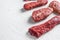 Set of denver, top blade, tri tip steak, machete, flank, bavette London broil marble beef on white background side view close up