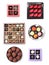 Set with different boxes of chocolate candies on background, top view