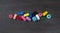 a set of different colorful yarn rolls threat for knitting, view from above wide long banner for web