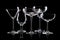 Set of different empty glasses for drinks on black background